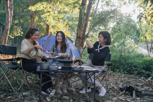 istock three bestie go camping in the forest 1406840467