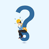 istock A contractor is thinking about the question and sitting on a big question mark symbol... 1406842488