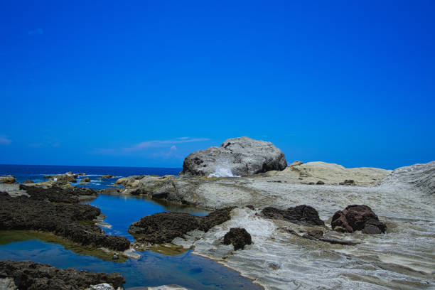 Shitiping is like a stone staircase. Hualien County, Taiwan. Shitiping is formed by the uplifting of volcanic rock layers that have been worn flat by seawater erosion.
