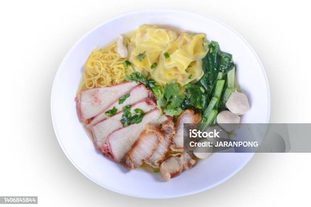 Chinese Noodle With Barbecue Pork And Wanton In The Soup On White Background Stock Photo - Download Image Now