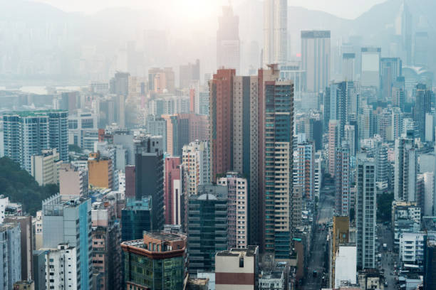 Hong Kong crowded buildings in the morning Hong Kong crowded buildings in the morning. mong kok stock pictures, royalty-free photos & images