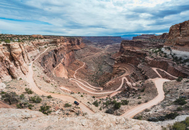 Road down into the Grand Canyon seen at Canyonlands National Park a cloudy afternoon in Utah, United States.