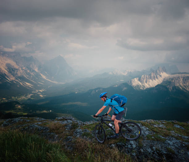 istock Man riding mountain bike 1406853319
