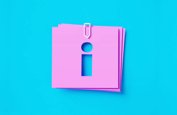 Info Symbol Written Cut Out Pink Adhesive Notes Sitting Over Blue Background Info symbol written cut out pink adhesive notes sitting on blue background. Horizontal composition with copy space. information symbol stock pictures, royalty-free photos & images