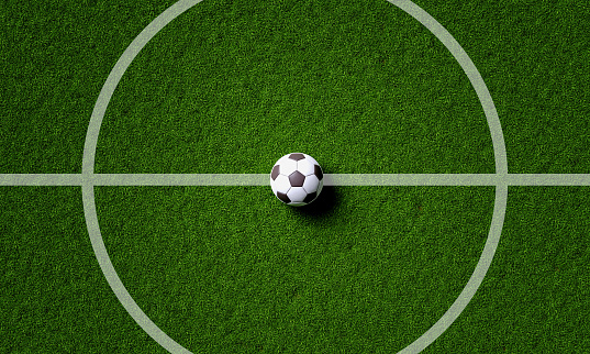 Campo de fútbol central y balón en el fondo de la vista superior. Concepto deportivo y atlético. Representación de ilustraciones 3D photo