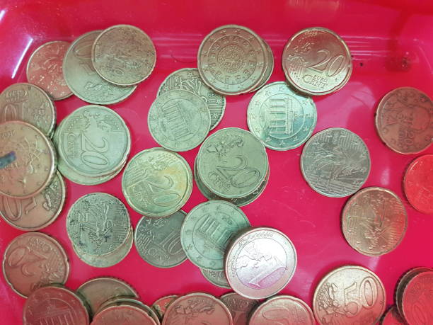 istock coins euros in plastiv bowl donate give offer 1406858829