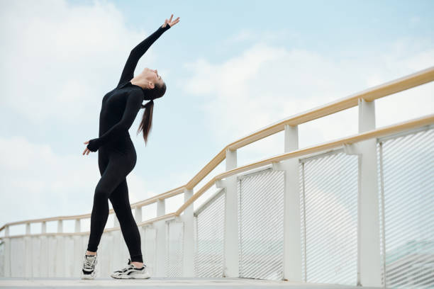 istock Young street dancer dancing outdoors 1406859228