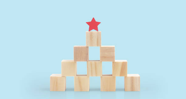 istock Wooden blocks with the five star symbol Increase rating 1406861111