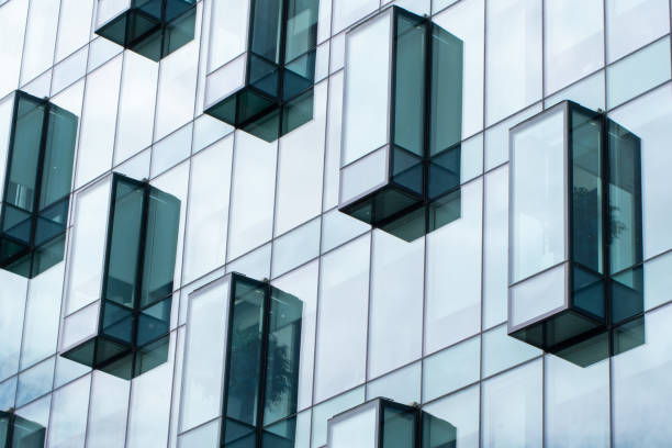 istock Abstract architecture background. Creative facade of the business building. 1406861787