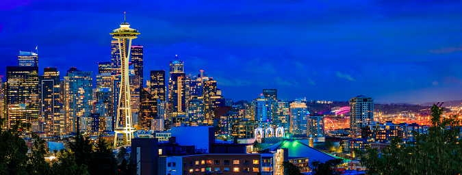 Downtown city skyline panoramic view with the Space Needle at sunset from Kerry Park in, Seattle Washington