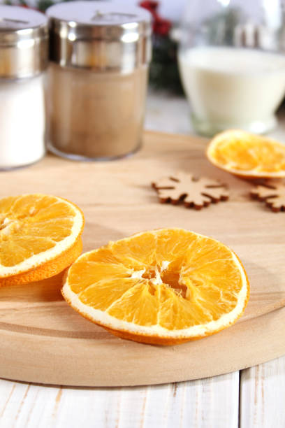 istock Christmas background with dry oranges and spices. 1406865692
