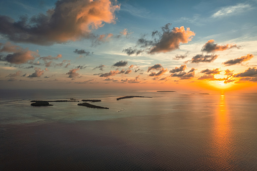 Aerial view of sunset over ocean in Maldives