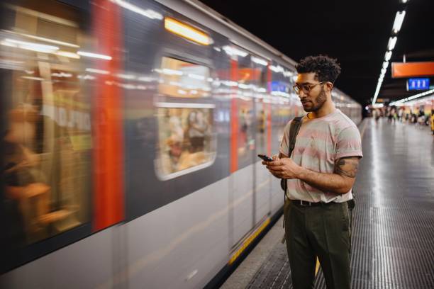 istock Man waiting for subway at station 1406868488