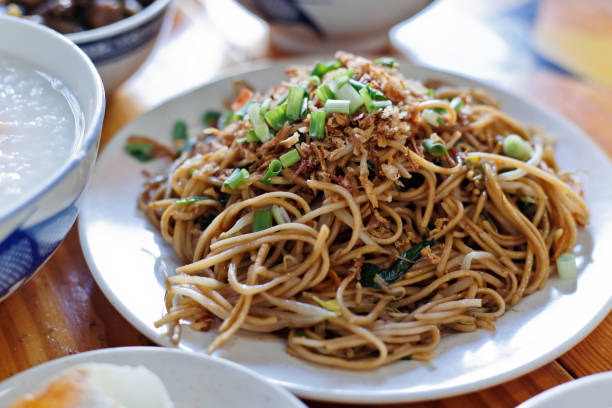 istock Asian fried noodles with soy sauce and vegetables 1406868951