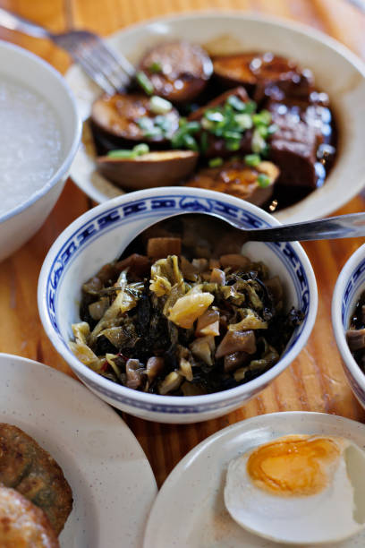 istock Chinese style rice porridge with various side dishes 1406868974