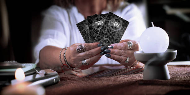 The concept of divination, magic and esotericism. Esoteric concept and astrology, Fortune telling tarot predictions background tarragon horizontal color image photography stock pictures, royalty-free photos & images