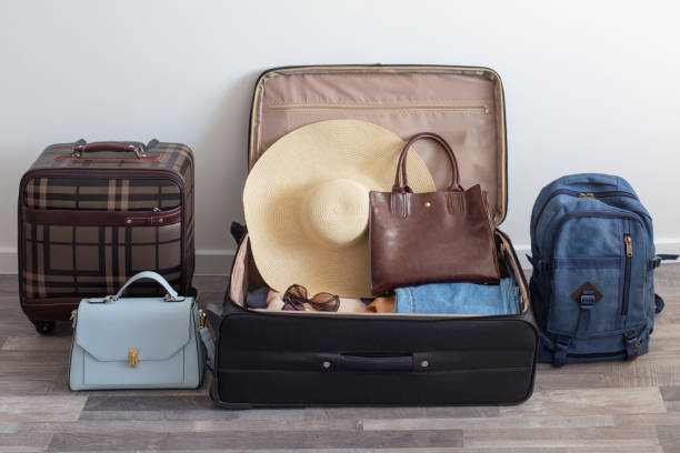 istock suitcases packed for travel on  living room floor 1406872205
