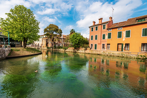 Cityscape of Treviso downtown with the river Sile and the street called Via Pescheria (fish market street and island). Veneto, Italy, Europe.