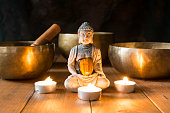 istock Still life with Tibetan singing bowls, minerals, candles and a Buddha figure. 1406876366