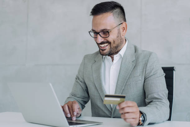 istock Shopping online in the office. 1406880394