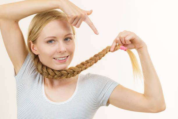 istock Blonde girl with braid hair 1406880540