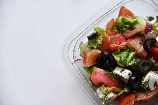 istock Caesar salad with chicken and white suluguni cheese 1406882342