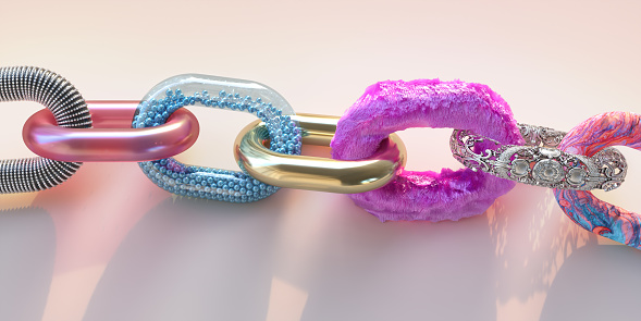 Conceptual image of a chain with individual links made from different materials and textures, depicting various types of data stored on the blockchain. With copy space against a plain background.