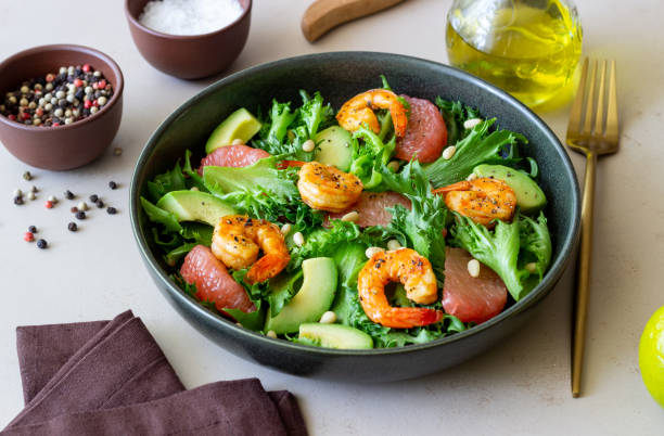 istock Salad with shrimp, grapefruit, avocado and nuts. Healthy eating. Diet. 1406885395