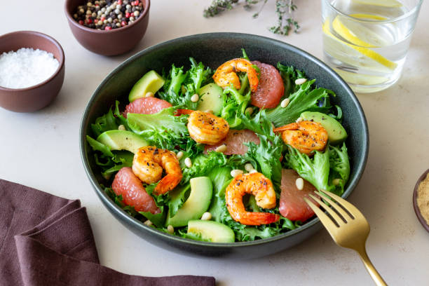 istock Salad with shrimp, grapefruit, avocado and nuts. Healthy eating. Diet. 1406885404