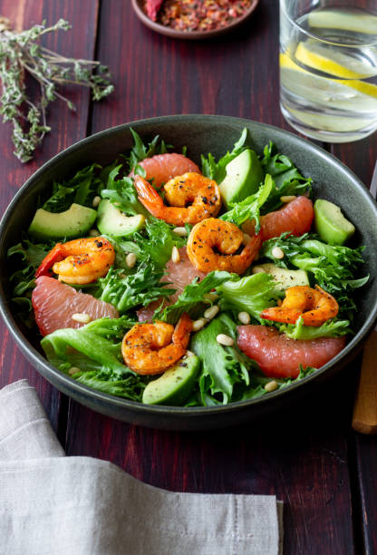 istock Salad with shrimp, grapefruit, avocado and nuts. Healthy eating. Diet. 1406885608