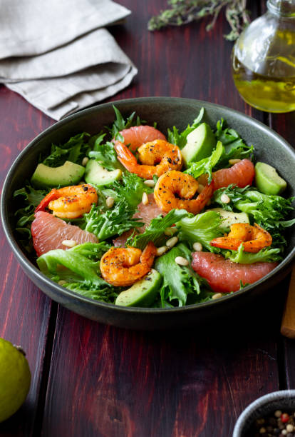 istock Salad with shrimp, grapefruit, avocado and nuts. Healthy eating. Diet. 1406885634