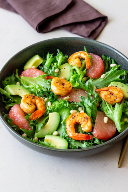 istock Salad with shrimp, grapefruit, avocado and nuts. Healthy eating. Diet. 1406885755