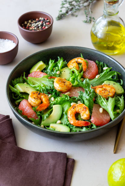 istock Salad with shrimp, grapefruit, avocado and nuts. Healthy eating. Diet. 1406885800