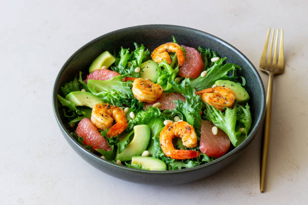 istock Salad with shrimp, grapefruit, avocado and nuts. Healthy eating. Diet. 1406885812