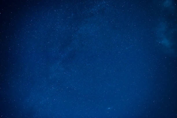 istock Dark night sky with many stars 1406887964