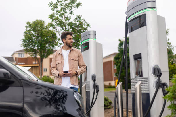 istock Charging Car in a Public Car Park 1406889656
