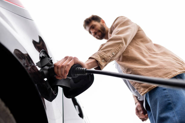 istock Plugging in Electric Car Charger 1406889749
