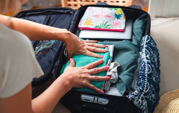 istock Packing suitcase for travel 1406889853