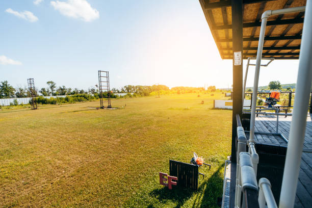 Golfer Perfecting Swing at Driving Range, Focusing on Power and Accuracy