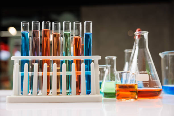 istock laboratory glassware and scientist tube glassware on plastic rack in laboratory with blur background. 1406892563