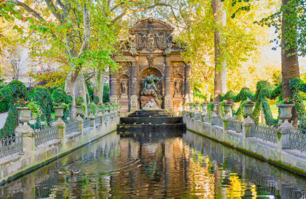Fountain Medici in luxembourg garden in Paris Romantic baroque style fountain Medici in luxembourg garden. Paris, France luxembourg paris stock pictures, royalty-free photos & images