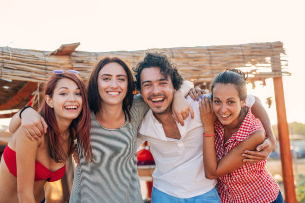 istock Friends at a beach camp 1406893142