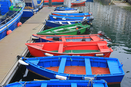 a rainy summer sunday enjoying the small boats in the port