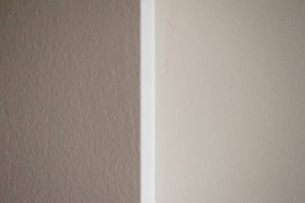 istock Background of white plastered wall. Space for inscription 1406894864