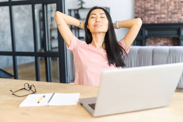 istock Successful young Asian businesswoman at workplace 1406897914