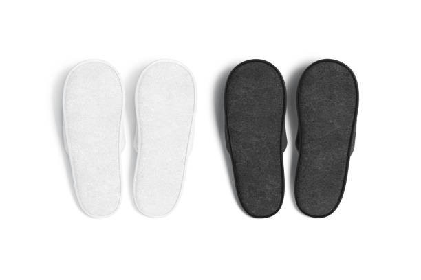 Blank black and white home slippers sole mockup, top view