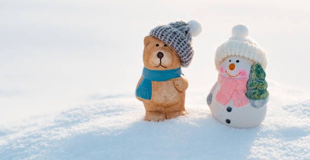 istock Christmas fun decorative figurines on a snowy background. Christmas card. 1406899668