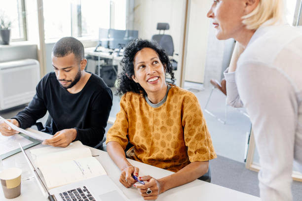 istock Business people having a meeting 1406902215