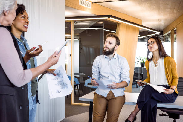 istock Business people having a meeting 1406902417