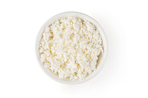 istock Fresh ottage cheese in wooden bowl 1406903645